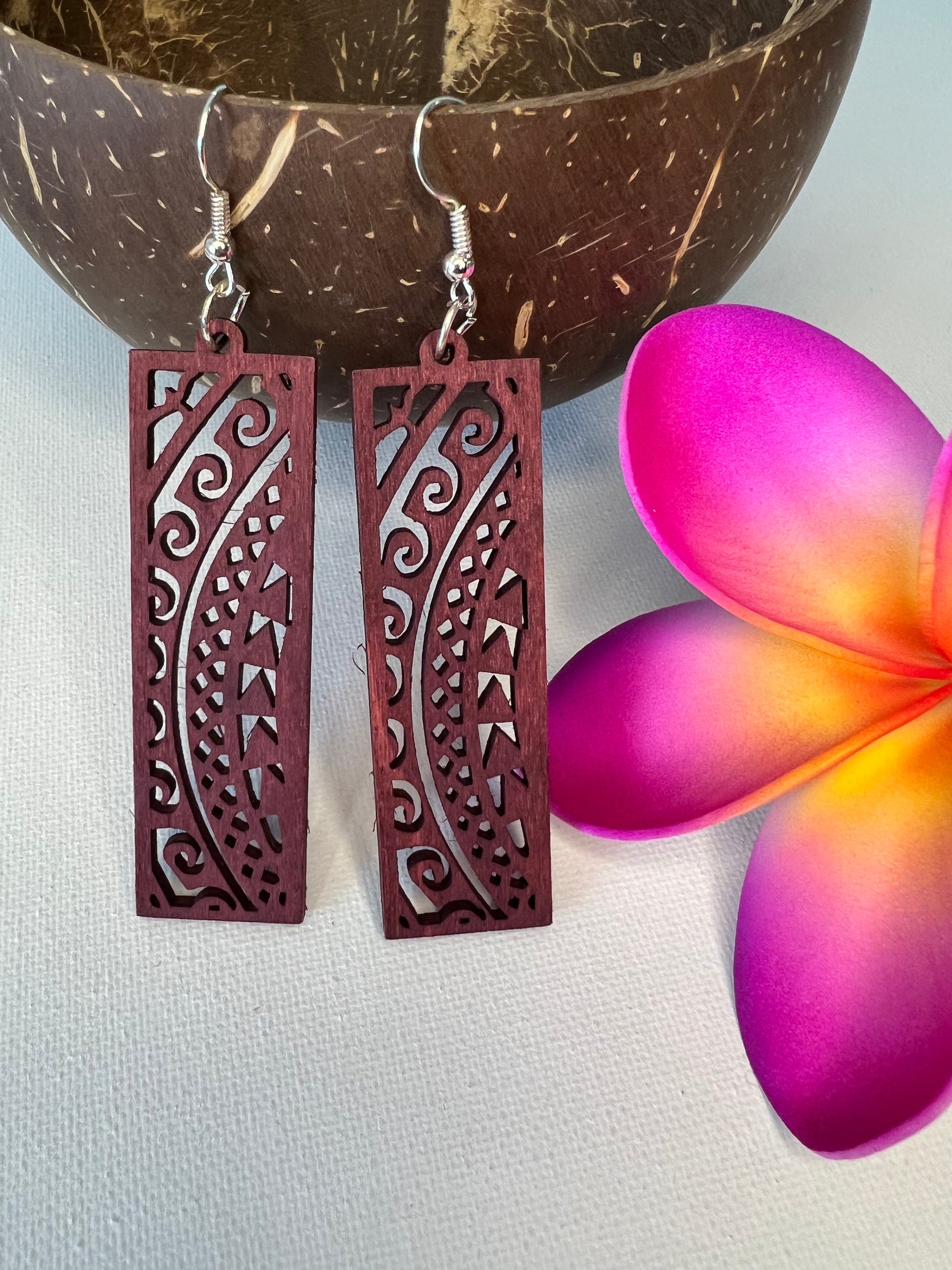 Maroon polynesian design hook earrings