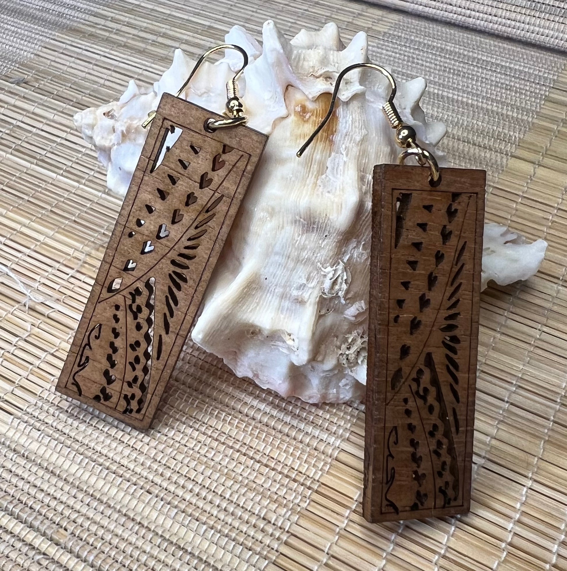 wood carved polynesian design earrings