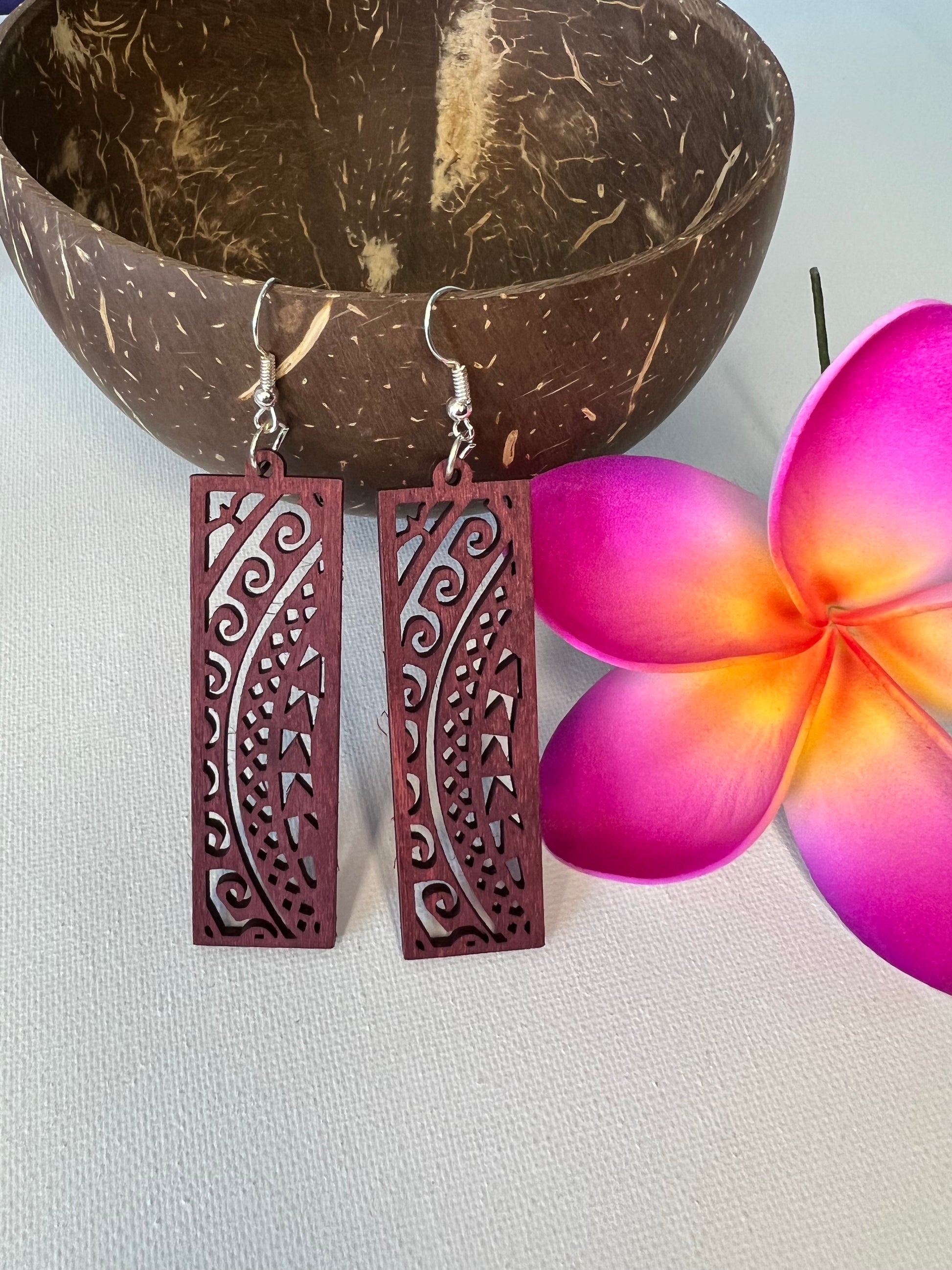 Maroon wood carved Polynesian design earrings