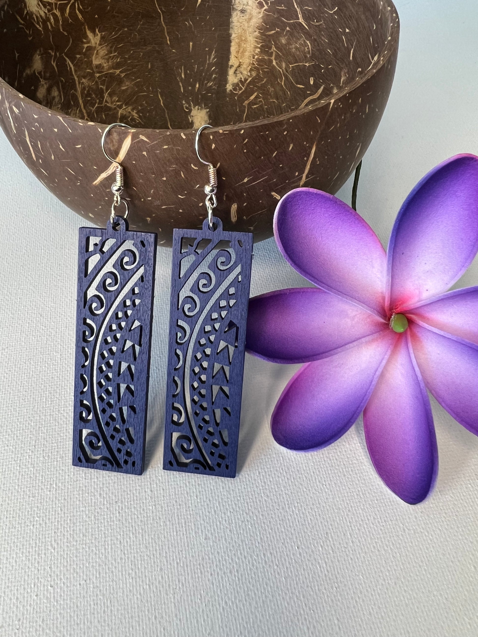 Blue wood carved Polynesian design earrings